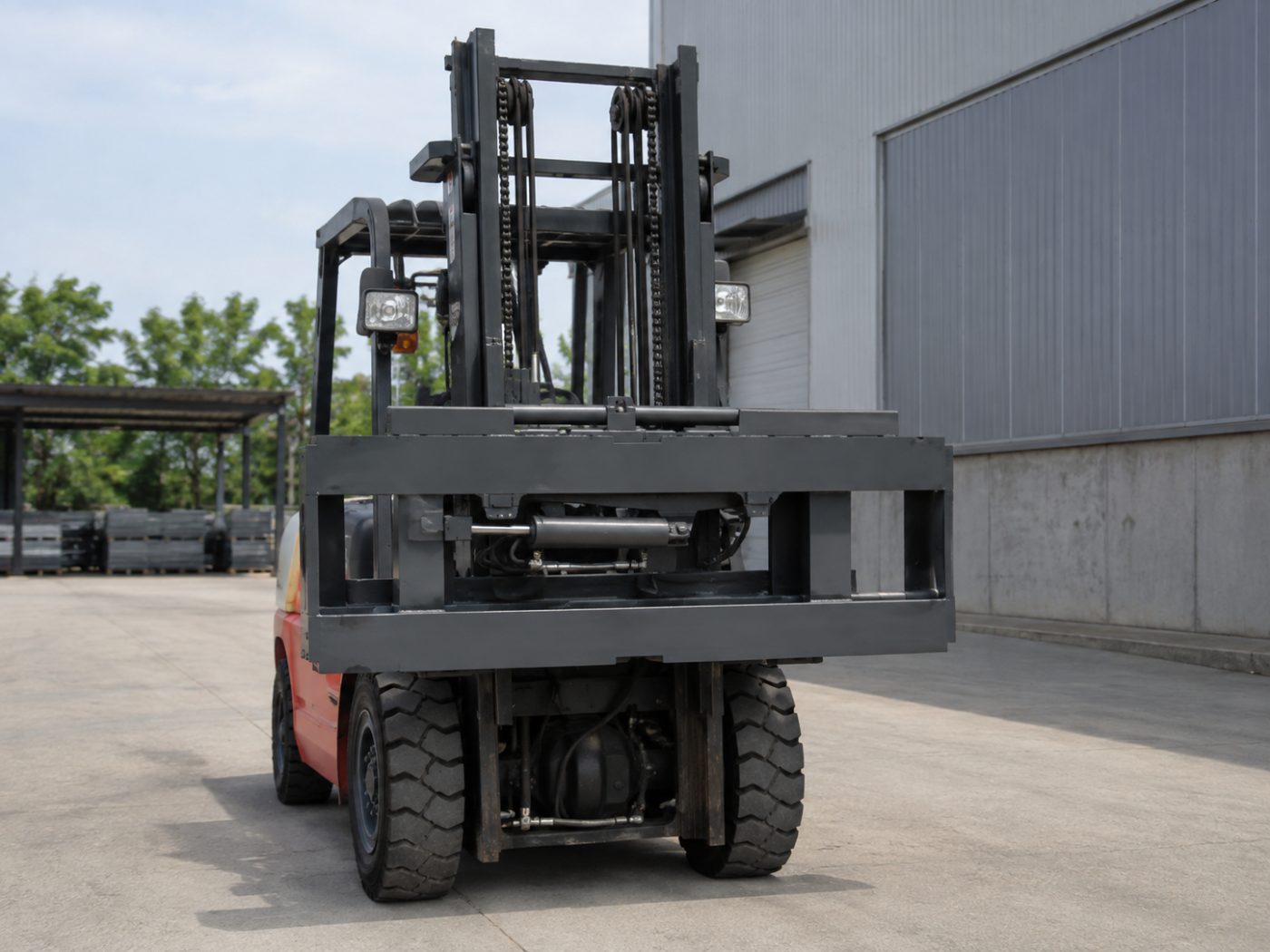 Selection of forklift attachments including clamps and rotators